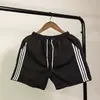 Pantalones Cortos de Verano para Hombre Pantalones de Tres Puntos para Correr Pantalones Amplios Grandes Estudiantes Simples de Secado Rápido Pantalones de Playa Moda para Parejas Pantalones de Pijama
