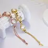 Pulsera de Piedra Ojo de Gato Chapada en Oro Real, Sensación de Lujo Ligero de Alta Gama, Joyería Redonda de Aleación, Venta al por Mayor para Mujeres