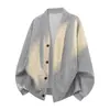 Chaqueta Cardigan de Punto Retorcido con Textura Jacquard y Patrón de Botón Retorcido de Doble Capa Cardigan de Punto. Datos disponibles
