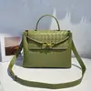 Bolso Tote de Cuero Genuino de Gran Capacidad Nuevo de Otoño Hebilla de Cuerda Metálica de Nicho Bolso Cruzado de Hombro Tejido para Mujer