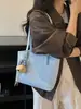 Bolso tote de alta gama de moda para mujer, nuevo bolso de hombro versátil de moda 2026, bolso grande simple y elegante