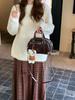 Bolsa artesanal original para mulheres 2024 Novo estilo coreano outono e inverno retrô preta portátil pequena bolsa de ombro bolsa transversal