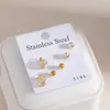 Pendientes de acero inoxidable transfronterizos europeos y americanos más vendidos para mujer, pendientes con forma de corazón chapados en oro con incrustaciones completas de diamantes, elegante y único conjunto de pendientes de tres piezas