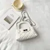 Bolso de cadena con patrón de rombos para mujer, nuevo modelo 2026, diseño de nicho para el trabajo, bolso de hombro texturizado, bolso pequeño cuadrado cruzado