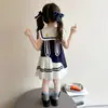 Vestido de Verão para Meninas 2026 Versão Coreana Desenho Animado Vestido Polo Regata Estilo College para Menininhas Vestido Plissado Infantil Estilo Tendência