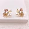 Pendientes de mariposa con camelia francesa, aguja de plata S925, pendientes de moda sencillos y avanzados, pendientes versátiles con perlas de cristal.
