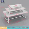 Expositor Promocional Papelería Isla para Madre y Bebé Apilador Gabinete de Exhibición de Cosméticos de Alta Calidad Mesa Flujo de Tres Niveles Estantería de Acero y Madera