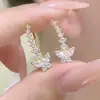 Aretes de Mariposa de Zircón Púrpura Super Hada para Mujer Diseño Nicho Aretes Exquisitos Versátiles Aretes Personalizados de Alta Gama