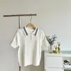 Nova Moda Primavera e Verão Estilo Coreano Exclusivo de Shopping Manga Curta Tricô Trançado Feminino Cor de Faculdade Blocos de Cor Tricô Polo Manga Curta Top Fino