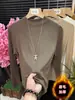 Camiseta Base de Cuello Medio Alto para Otoño e Invierno para Mujer 2026 Nuevo Mousse Cepillado Más Terciopelo Ajuste Delgado Cálido Nicho Ropa Interior Superior