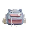 Bolsos cruzados de lona al por mayor para niñas, bolsos de hombro lindos y dulces, bolsos cruzados para estudiantes suaves y frescos
