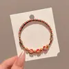 Pulseira de Alta Qualidade Estilo Zongzi 2026 Nova para o Festival do Barco-Dragão, Pulseira de Fio Colorido Estilo Xizang com Pingente de Paz, Corda de Mão Estilo Étnico