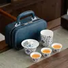 Tendencia Nacional Cerámica Dehua Estilo Chino Tazón con Tapa de Loto Similar al Jade Juego de Té Kung Fu Caja de Regalo de Cuero de Gama Alta Personalizable