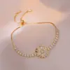 Colar para Mulheres, Estilo Influenciador Transfronteiriço Flor de Girassol Zircônia Rotativo Conjunto de Três Peças Decoração Colar de Aço Titânio