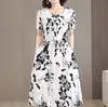 2026 Nuevo Estilo Algodón Seda Elegante Moda Femenina Holgado Estampado Talla Grande Vestido de Rayón de Longitud Media para Abrigo para Mamás