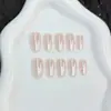 Arte de uñas ojo de gato con lunares color durazno electrochapado, elegante y con estilo, favorecedor y versátil, uñas postizas hechas a mano, producto terminado al por mayor