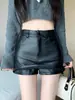Pantalones de cuero PU falda corta para mujer otoño e invierno 2023 nuevos negros línea A falda tubo pantalones cintura alta adelgazantes pantalones de bota