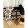 Chaleco de punto jacquard retro de piel de mapache para mujer, cuello redondo, cárdigan de botones, versátil, adelgazante, sin mangas, prenda para superponer