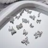 1000 Piezas de Decoraciones de Moños para Uñas de Aleación Mixta, Moños de Cinta Huecos, Pedrería Plateada para Uñas, Al por Mayor