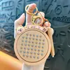 Llavero de dibujos animados creativos kappi bala de cara giratoria lindo colgante para mochila escolar llavero para llaves de coche pequeño regalo al por mayor