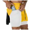 Venta directa de fábrica marca de moda de doble capa transpirables de secado rápido para hombre, pantalones cortos deportivos de verano de secado rápido de longitud de cuarto para fitness