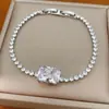 Pulsera con cierre de mariposa cuadrada chapada en oro real con circonita, de alta gama y lujo ligero, joyería exquisita y moderna para mujer