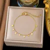 Collar de acero de titanio versátil europeo y americano para mujer, cadena de clavícula de diseño de nicho de lujo ligero, cadena de lana, nuevos accesorios de moda 2024