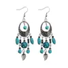 Brincos turquesa estilo étnico vintage europeu e americano, brincos pendentes de borla turquesa boêmios, brincos mais vendidos das áreas cênicas de Yunnan