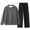 Otoño/Invierno 2026 Nuevo Sudadera con Capucha Casual Holgada de Manga Larga y Pantalones Largos Estilo Americano Trendy con Diseño de Remaches Cuello Redondo Marca Trendy Tridimensional