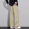 Nuevos pantalones casuales de color sólido con textura para otoño para hombre, corte recto holgado, marca de moda, versátiles, adelgazantes, pantalones de trabajo de pierna ancha hasta el suelo
