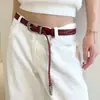 Cinturón tejido liso de color sólido personalizado para mujer, adecuado para faldas y jeans, no necesita agujeros, cinturón delgado de cuero retro de alta gama