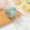 Fábrica al por mayor de cintas de hilo de cola de pescado, materiales florales, hilo con material para cajas de dulces, lazos para pasteles, embalaje de regalo a mano
