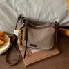 Bolso pequeño tejido exquisito transfronterizo para mujer, nuevo bolso cruzado versátil de moda otoño 2026, bolso de hombro único popular tipo empanada
