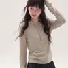 Suéter de punto con capucha color naranja estilo coreano para mujer, diseñado para usar en capas en otoño e invierno, con corte ajustado y efecto adelgazante