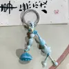 Llavero de Flor de Loto de Colores de Jingdezhen Colgante de Cerámica Estilo Étnico Accesorios para Puestos del Mercado Nocturno Artísticos Tejidos Venta al por mayor