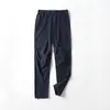 Calças outdoor para casal, calças softshell macias com corte curvo tridimensional, calças esportivas casuais de perna reta, secagem rápida, versáteis, táticas para homens, primavera e outono