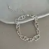 Pulsera de Metal Trenzado Ovalada Hueca Inspirada en Diseño Retro para Mujer, Accesorio de Moda Único y Moderno