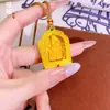 Colgante de Caja Gawu de Latón Chapado en Oro con Dios de la Riqueza Amarillo, Estilo Vintage, Lujo Ligero, Diseño Simple, Cadena de Suéter Color Oro Arena, Alta Retención de Color