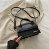 Bolso bandolera texturizado retro de moda de un solo hombro estilo europeo y americano con letras moda 2025 verano nuevo bolso de mano casual para mujer