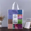 Bolsas al por mayor Color Impreso Publicidad Bolsas no tejidas Portátil Bolsas de embalaje para ropa Bolsas ecológicas Bolsas de hombro tipo tote
