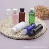 Botella de 50 ml con tapa normal botella dispensadora rosa botella dispensadora con tapa de rosca de 50 ml botella para loción de 50 ML botella para aceites esenciales recipiente para aceite