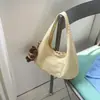 Bolso de mujer coreano, nuevo modelo verano 2026, bolso tote de nailon casual de color liso, bolso de mano y bandolera de nicho de moda