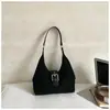Bolso de mano sencillo y casual para mujer 2026 nuevo bolso de hombro retro coreano bolso cruzado de nicho para el trabajo