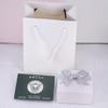 Caja de embalaje caja de aretes caja de collar caja de pulsera caja de anillos bolsa de mano paño para limpiar plata agua para limpiar plata una generación de 001