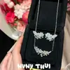 Hermana Hada Flor de Glicina Borla Sonriente Gota de Agua Collar de Perlas Joyería de Alta Gama Conjunto de Aretes Fuegos Artificiales de Diamante Brillantes