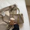 Bolsa de ombro feminina casual, simples, portátil, nova, primavera de 2025, bolsa tote, bolsa transversal