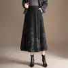 Falda estampada sencilla y elegante para mujer, nuevo modelo otoño e invierno 2026, de cintura alta, adelgazante, de longitud media, elegante y versátil, falda de bajo amplio