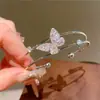 Pulsera Abierta de Mariposa de Doble Capa Super Brillante de Zirconia Moda de Gama Alta Joyería de Mano Ligera de Lujo con Temperamento Simple y Versátil para Mujeres