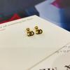 Venta caliente acero titanio chapado en oro real 18K aretes de tuerca de letra de barra curva venta caliente transfronteriza de transmisión en vivo