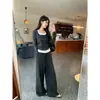 Conjunto de calça pantalona de manga longa cinza de falso duas peças, casual e versátil para o início do outono, com top cinza escuro